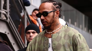 Formula One F1 - Sao Paulo Grand Prix - Autodromo Jose Carlos Pace, Sao Paulo, Brazil - November 9, 2025 Ferrari's Lewis Hamilton arrives ahead of the race REUTERS/Jean Carniel