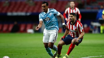 Luis Suarez of Atletico de Madrid and Renato Tapia of Celta in action during the spanish league, La Liga Santander, football match played between Atletico de Madrid and RC Celta de Vigo at Santa Metropolitano stadium on february 08, 2021, in Madrid, Spain