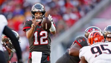 TAMPA, FLORIDA - DECEMBER 18: Tom Brady #12 of the Tampa Bay Buccaneers catches the snap during the first quarter in the game against the Cincinnati Bengals at Raymond James Stadium on December 18, 2022 in Tampa, Florida.   Douglas P. DeFelice/Getty Images/AFP (Photo by Douglas P. DeFelice / GETTY IMAGES NORTH AMERICA / Getty Images via AFP)