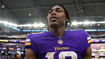 MINNEAPOLIS, MINNESOTA - SEPTEMBER 11: Justin Jefferson #18 of the Minnesota Vikings celebrates on the field after defeating the Green Bay Packers 23-7 at U.S. Bank Stadium on September 11, 2022 in Minneapolis, Minnesota.   Stephen Maturen/Getty Images/AFP