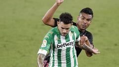 SEVILLE, SPAIN - SEPTEMBER 26: Antonio Sanabria of Real Betis battles for possession with Casemiro of Real Madrid during the La Liga Santader match between Real Betis and Real Madrid at Estadio Benito Villamarin on September 26, 2020 in Seville, Spain. Sp