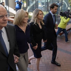 Why is Elizabeth Holmes not in prison? When would she have to start her sentence?