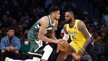 LOS ANGELES, CALIFORNIA - FEBRUARY 08: Giannis Antetokounmpo #34 of the Milwaukee Bucks dribbles the ball against LeBron James #6 of the Los Angeles Lakers in the second quarter at Crypto.com Arena on February 08, 2022 in Los Angeles, California. NOTE TO USER: User expressly acknowledges and agrees that, by downloading and/or using this Photograph, user is consenting to the terms and conditions of the Getty Images License Agreement.   Ronald Martinez/Getty Images/AFP
== FOR NEWSPAPERS, INTERNET, TELCOS & TELEVISION USE ONLY ==