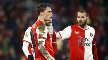 From left: Feyenoord's dutch midfielder #20 Mats Wieffer and Feyenoord's Dutch defender #02 Bart Nieuwkoop celebrate a 1-0 goal during the Dutch Eredivisie match between Feyenoord and RKC Waalwijk at Feyenoord Stadion de Kuip in Rotterdam on February 18, 2024. (Photo by MAURICE VAN STEEN / ANP / AFP) / Netherlands OUT