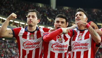   Fernando Beltran celebrates his goal 1-0 with Alan Mozo and Cristian Calderon of Guadalajara  during the Quarterfinals first leg match between Guadalajara and Pumas UNAM as part of Torneo Apertura 2023 Liga BBVA MX, at Akron Stadium, November 30, 2023, in Guadalajara, Jalisco, Mexico.