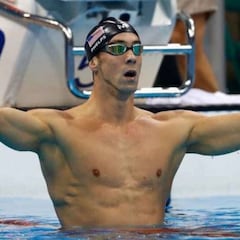 When did Michael Phelps retire? How many medals did he win?