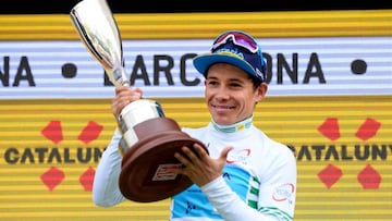 AstanaxB4s Colombian Miguel Angel Lopez overall leader celebrates next after winning the 99th Volta Catalunya 2019 on March 31, 2019 in Barcelona. (Photo by Josep LAGO / AFP)