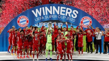 FC Bayern Munich Bayern Munich's German goalkeeper Manuel Neuer and teammates celebrate with the trophy after winning the UEFA Super Cup football match between FC Bayern Munich and Sevilla FC at the Puskas Arena in Budapest, Hungary on September 24,