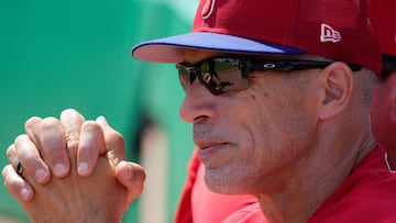 (FILES) In this file photo taken on March 19, 2022, Manager Joe Girardi of the Philadelphia Phillies watches a pregame ceremony prior to the Spring Training game against the Toronto Blue Jays in Clearwater, Florida. - The Philadelphia Phillies sacked manager Joe Girardi on June 3, 2022,, citing the team's sluggish start to the season. Phillies president of baseball operations Dave Dombrowski said in a statement the team had decided to part company with Girardi after a "frustrating" campaign. (Photo by Mark Brown / GETTY IMAGES NORTH AMERICA / AFP)