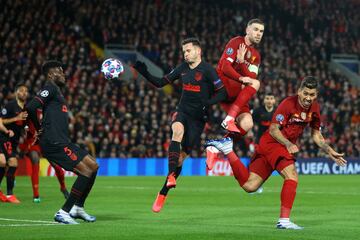 Saúl Ñí­guez y Jordan Henderson.