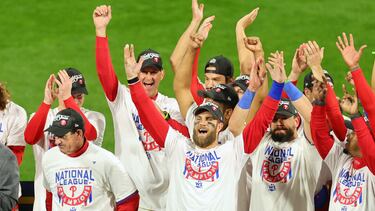 PHILADELPHIA, PENNSYLVANIA - OCTOBER 23: Bryce Harper #3 of the Philadelphia Phillies celebrates with teammates after defeating the San Diego Padres in game five to win the National League Championship Series at Citizens Bank Park on October 23, 2022 in Philadelphia, Pennsylvania. Michael Reaves/Getty Images/AFP