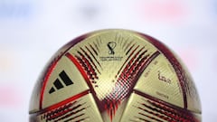 The "Al Hilm" ball, the official match ball which will be used in the Qatar 2022 World Cup football semi-finals and final, is displayed during a press conference in Doha on December 13, 2022. (Photo by FRANCK FIFE / AFP)