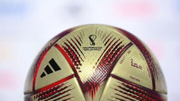 The "Al Hilm" ball, the official match ball which will be used in the Qatar 2022 World Cup football semi-finals and final, is displayed during a press conference in Doha on December 13, 2022. (Photo by FRANCK FIFE / AFP)