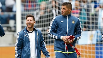 Jun 14, 2016; Seattle, WA, USA; Argentina midfielder Lionel Messi (10, left) and goalkeeper Mariano Andujar (23) walk to the bench before a game against Bolivia in the group play stage of the 2016 Copa America Centenario. Mandatory Credit: Joe Nicholson-USA TODAY Sports