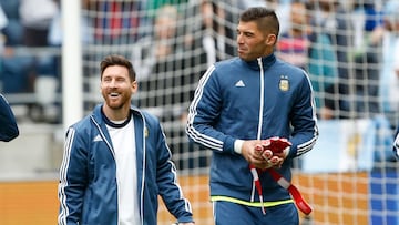 Jun 14, 2016; Seattle, WA, USA; Argentina midfielder Lionel Messi (10, left) and goalkeeper Mariano Andujar (23) walk to the bench before a game against  Bolivia in the group play stage of the 2016 Copa America Centenario. Mandatory Credit: Joe Nicholson-USA TODAY Sports