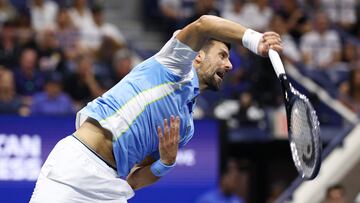 NEW YORK, NEW YORK - SEPTEMBER 08: Novak Djokovic of Serbia serves against Ben Shelton of the United States during their Men's Singles Semifinal match on Day Twelve of the 2023 US Open at the USTA Billie Jean King National Tennis Center on September 08, 2023 in the Flushing neighborhood of the Queens borough of New York City.   Elsa/Getty Images/AFP (Photo by ELSA / GETTY IMAGES NORTH AMERICA / Getty Images via AFP)