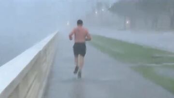 Surreal scene: journalist spots man jogging as Hurricane Milton hits Tampa
