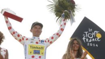 Rafal Majka, en el podio del Tour.