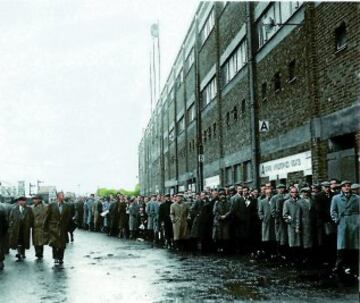 Mourners queue at Old Traffford to pay their respects to the eight players, three club staff, eight journalists, two crew members and two passengers who were killed in the accident.