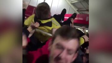 Wolves fans get Stoke security guard crowd-surfing