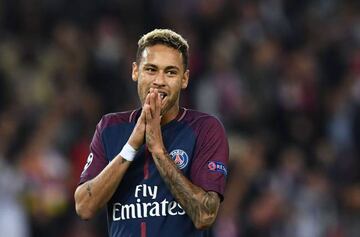 (FILES) This file photo taken on September 27, 2017 shows Paris Saint-Germain's Brazilian forward Neymar reacting during the UEFA Champions League football match against Bayern Munich at the Parc des Princes stadium in Paris.  Brazil star Neymar, 25, won 