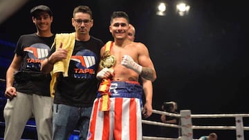 Carlos Ramos, tras ganar el Nacional del pluma.