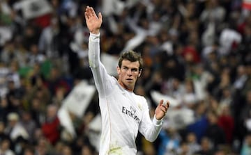 Real Madrid's Welsh forward Gareth Bale waves to the crowd after the UEFA Champions League semifinal first leg football match Real Madrid CF vs FC Bayern Munchen at the Santiago Bernabeu stadium in Madrid on April 23, 2014. Real Madrid won the match 1-0.