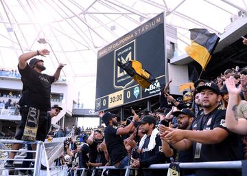 LOS ANGELES, CA - APRIL 29: Fans gather and cheer in and around a new stadium before the inaugural home match of Los Angeles FC against the Seattle Sounders at Banc of California Stadium on April 29, 2018 in Los Angeles, California. Harry How/Getty Images/AFP
== FOR NEWSPAPERS, INTERNET, TELCOS & TELEVISION USE ONLY ==