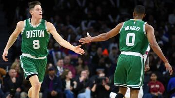 Nov 19, 2016; Auburn Hills, MI, USA; Boston Celtics forward Jonas Jerebko (8) high fives guard Avery Bradley (0) during the first quarter against the Detroit Pistons at The Palace of Auburn Hills. Mandatory Credit: Tim Fuller-USA TODAY Sports