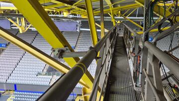 This photograph taken in Dortmund on June 6, 2024 shows the BVB Stadion Dortmund's catwalk. German police said on June 30, 2024 a 21-year-old man who climbed onto the roof of the stadium during Germany's Euro 2024 clash against Denmark wanted to document the stunt. The intruder at the Westfalen stadium in Dortmund told law enforcement after his arrest he only wanted to take "good photos", local police said in a statement. The man was spotted in the rafters of the stadium on June 29, 2024 at 10:11 pm (20:11 GMT) during the last-16 match, police said. (Photo by OZAN KOSE / AFP)