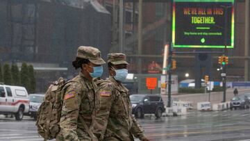 Military personnel walk outside the Javitz convention center on April 26, 2020 in New York City. 