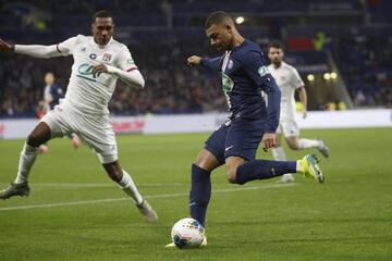 Kylian Mbappé of PSG against Lyon's Marcelo.