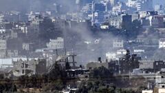 An Israeli flag can be seen inside Gaza Strip, looking in from the Israeli side of the border, amid the ongoing conflict between Israel and the Palestinian group Hamas, November 11, 2023. REUTERS/Evelyn Hockstein