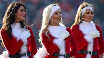 Denver Broncos cheerleaders wearing Christmas-themed costumes