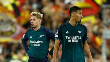 Soccer Football - Champions League - Group B - RC Lens v Arsenal - Stade Bollaert-Delelis, Lens, France - October 3, 2023 Arsenal's Emile Smith Rowe and William Saliba react REUTERS/Christian Hartmann