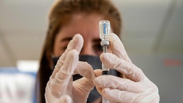 Home base primary care Pharmacist Erin Edmonds fills five syringes with the Johnson & Johnson Covid-19 Janssen Vaccine for use in at home vaccinations at the US Department of Veterans Affairs' VA Boston Healthcare System's Jamaica Plain Medical Center in Boston, Massachusetts on March 4, 2021. - The mobile vaccination team is in it's fifth week of at home vaccinations and has vaccinated 183 veterans so far. Today marks the first day the Johnson & Johnson single shot Covid-19 Vaccine will be used. Boston VA received 300 vials of the Johnson & Johnson single shot Covid-19 vaccine so far and expects more on the way. (Photo by Joseph Prezioso / AFP)