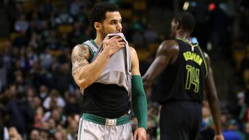 Mar 31, 2018; Boston, MA, USA; Boston Celtics guard Shane Larkin (8) holds his jersey after missing a layup during the second half of their 112-106 loss to the Atlanta Hawks at TD Garden. Mandatory Credit: Winslow Townson-USA TODAY Sports