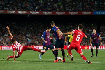 Bernardo Espinosa y Leo Messi.