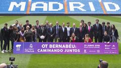 MADRID, SPAIN - APRIL 06:  Singers of OT 2017, players and staff of Real Madrid FC pose during the presentation of &#039;OT Bernabeu. Caminando Juntos&#039; concert at the Santiago Bernabeu Stadium on April 6, 2018 in Madrid, Spain.  (Photo by Carlos R. A