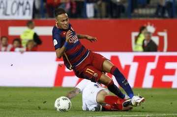 Sevilla's Ever Banega fouls Barcelona's Neymar resulting in him being sent off