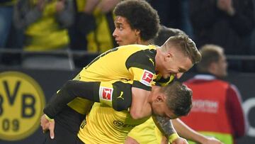 Dortmund's Danish forward Jacob Bruun Larsen celebrates scoring the opening goal with his teammates during the German first division Bundesliga football match Borussia Dortmund vs 1. FC Nuremberg in Dortmund, westhern Germany, on September 16, 2018.