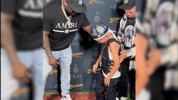 El tierno momento de 50 Cent con un niño