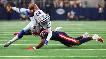 ARLINGTON, TEXAS - OCTOBER 01: Christian Gonzalez #6 of the New England Patriots tackles Tony Pollard #20 of the Dallas Cowboys during the second quarter at AT&T Stadium on October 01, 2023 in Arlington, Texas.   Richard Rodriguez/Getty Images/AFP (Photo by Richard Rodriguez / GETTY IMAGES NORTH AMERICA / Getty Images via AFP)