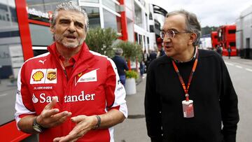 Ferrari Formula One team leader Maurizio Arrivabene (L) and Sergio Marchionne, CEO of Fiat Chrysler automobil arrive in the paddock before the start of the Austrian F1 Grand Prix at the Red Bull Ring circuit in Spielberg, Austria, June 21, 2015.  REUTERS/Leonhard Foeger