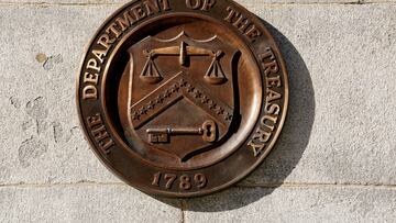 FILE PHOTO: A bronze seal for the Department of the Treasury is shown at the U.S. Treasury building in Washington, U.S., January 20, 2023. REUTERS/Kevin Lamarque/File Photo