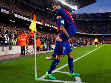 BARCELONA, SPAIN - APRIL 05:  Lionel Messi (R) of FC Barcelona celebrates with his teammate Luis Suarez (L) after scoring his team&#039;s second goal during the La Liga match between FC Barcelona and Sevilla FC at Camp Nou stadium on April 5, 2017 in Barcelona, Spain.  (Photo by Alex Caparros/Getty Images)