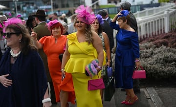 Racegoers attend the second day of the Grand National Festival horse race meeting at Aintree Racecourse in Liverpool, north-west England, on April 12, 2024. (Photo by Oli SCARFF / AFP)