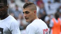 Paris Saint-Germain&#039;s Ivorian defender Serge Aurier (L) and Paris Saint-Germain&#039;s Italian midfielder Marco Verratti (R) warm up prior to the  French Cup final football match between Paris Saint-Germain (PSG) and Angers (SCO) on May 27, 2017, at the Stade de France in Saint-Denis, north of Paris. / AFP PHOTO / Jean-Francois MONIER