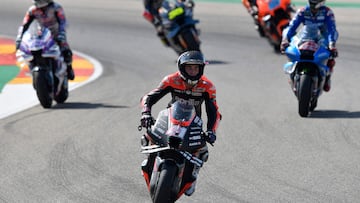 Third placed Aprilia Spanish rider Aleix Espargaro rides at the end of the Moto Grand Prix GP of Aragon at the Motorland circuit in Alcaniz on September 18, 2022. (Photo by Pau BARRENA / AFP)