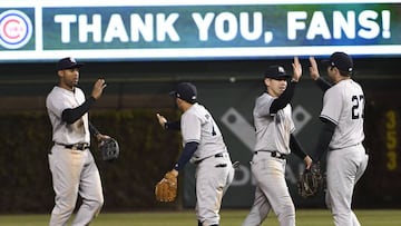 CHICAGO, IL - MAY 08: The New York Yankees celebrate their win against the Chicago Cubs on May 8, 2017 at Wrigley Field in Chicago, Illinois. The Yankees defeated the Cubs 5-4 in eighteen innings.   David Banks/Getty Images/AFP
 == FOR NEWSPAPERS, INTERNET, TELCOS &amp; TELEVISION USE ONLY ==